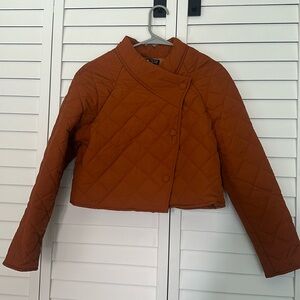 It’s a crop top jacket never worn. Brand new with no tags.